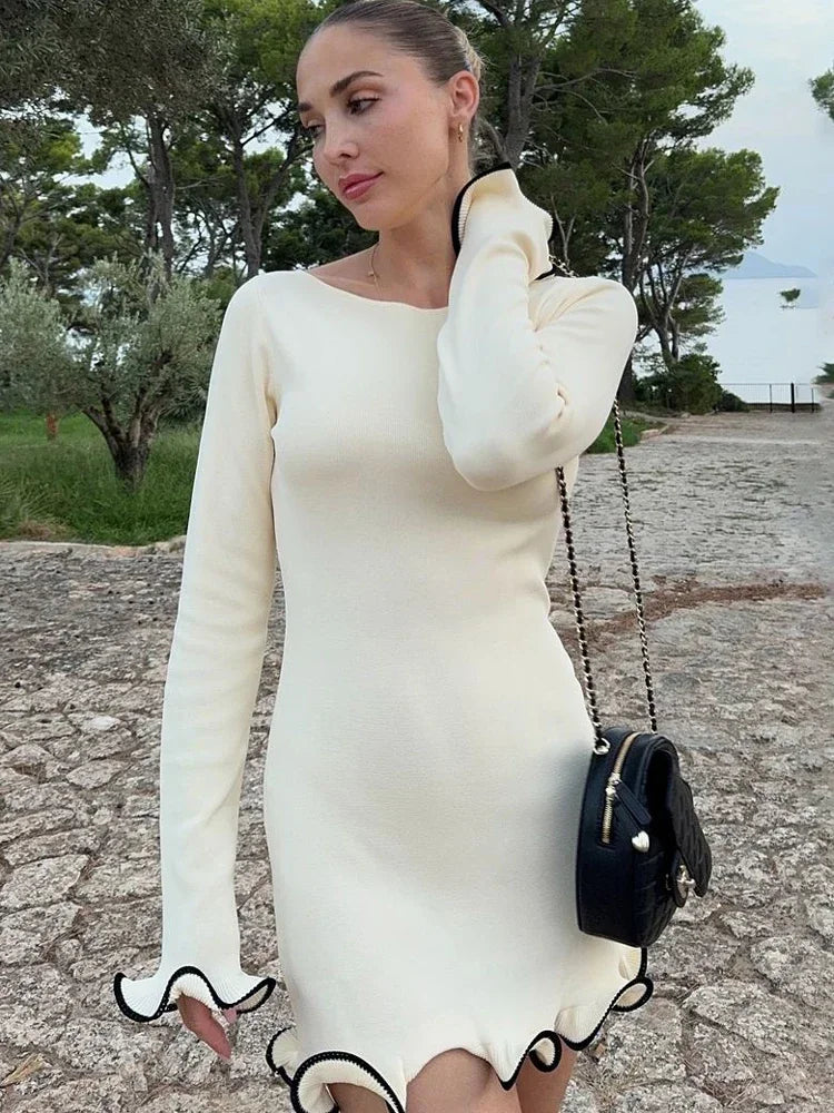 Moteriška megzta suknelė